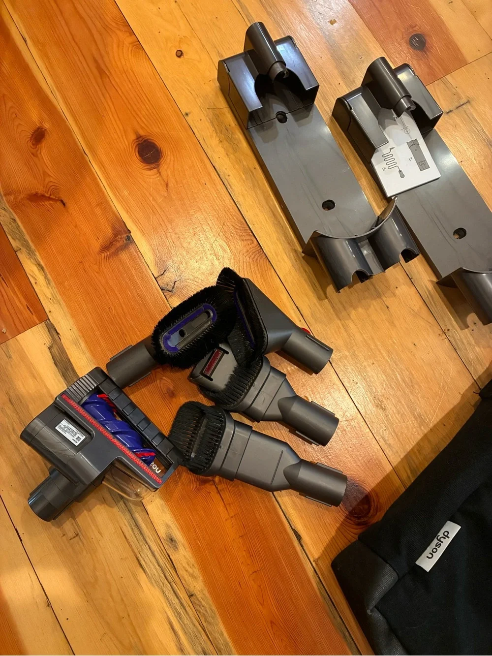 Dyson Black Carry Bag with Multiple Red-Accent Vacuum Accessories